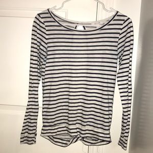 long-sleeve navy blue and white striped shirt.